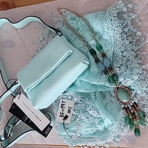 Aimee Kestenberg small crossbows handbag, matching lace scarf, and necklace.